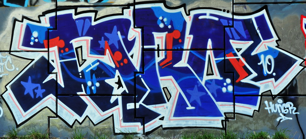 Photo showing graffiti on a wall